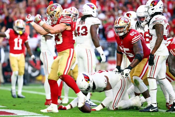 Dec 17, 2023; Glendale, Arizona, USA; San Francisco 49ers running back Christian McCaffrey (23) celebrates after running for a touchdown during the third quarter against the Arizona Cardinals at State Farm Stadium. Mandatory Credit: Mark J. Rebilas-USA TODAY Sports